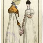 Divatkép - két nő fehér ruhában, sárga vállkendővel